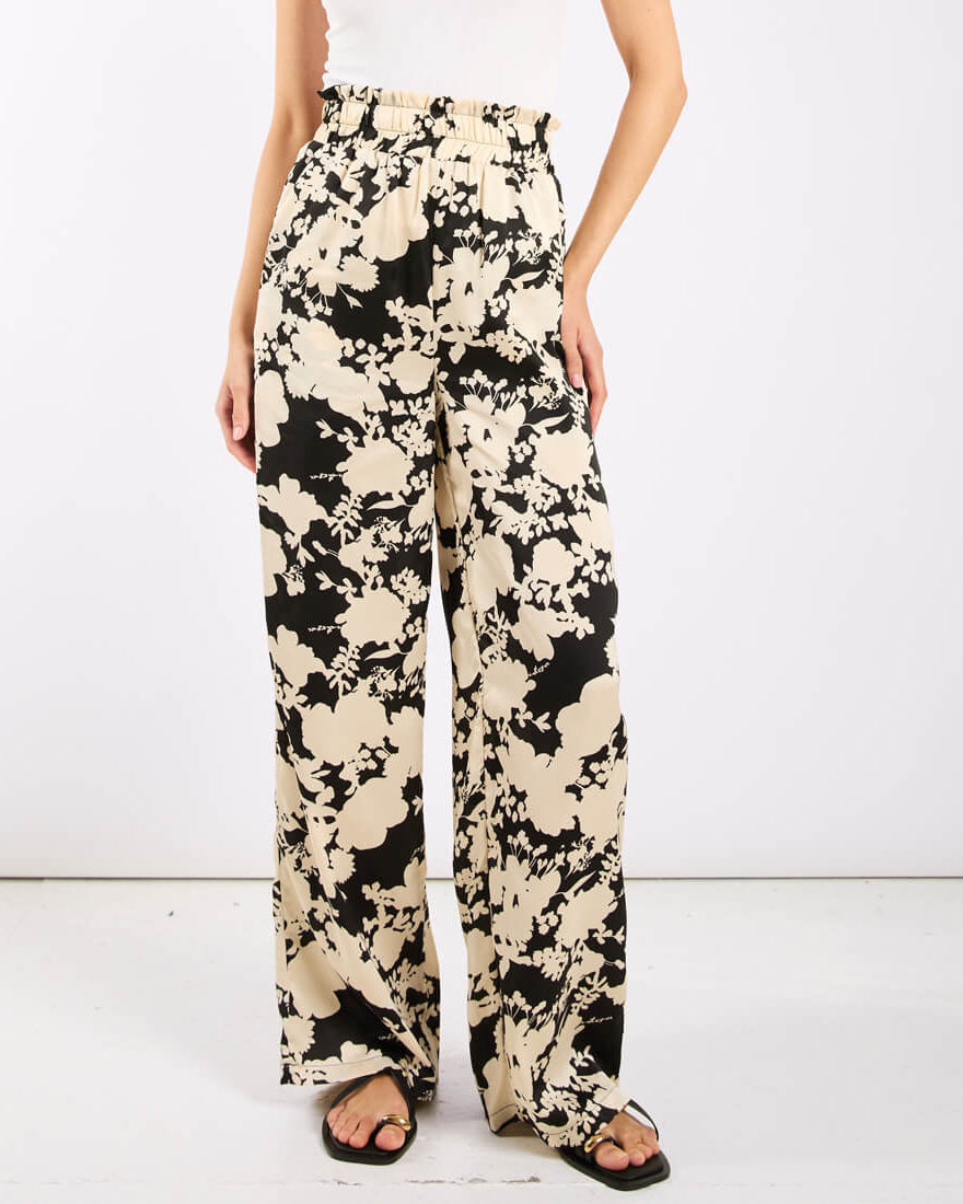 Ivory and black printed wide trousers