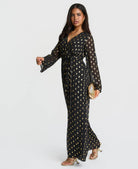 Black and gold spot jumpsuit - side view