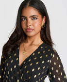 Black and gold foil chiffon jumpsuit - neckline detail