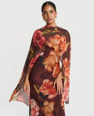 Brown floral chiffon maxi dress with cape - three quarter view